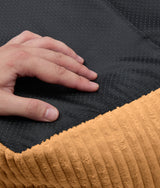 Non-slip base of the mustard corduroy CAFIDE Snozy dog bed