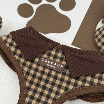 Close-up of Cotswolds Check harness neck panel, binding and Cocopup London label