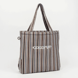 Front studio view of the Cocopup London brown and blue striped tote bag