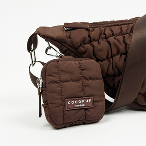 Espresso Crescent treat pouch clipped to a matching quilted brown dog walking bag