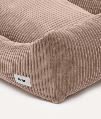 Close-up of mocha beige corduroy fabric and CAFIDE label