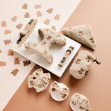 Theo Embroidered Teddy treat pouch in a flat lay with matching harness, bandana and accessories