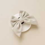 Brown Tweed Sailor Bow Tie angled right on a round display tile