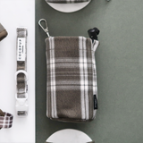 Olive Check drawstring treat pouch viewed straight from above beside a matching collar