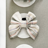 Front flat lay of the Oxford Plaid Sailor Bow Tie by Cocopup London