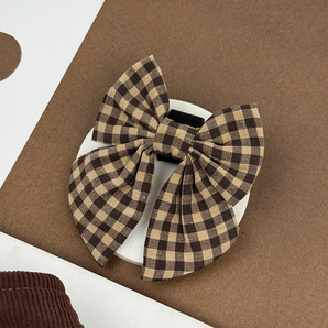 Cotswolds Check Sailor Bow Tie displayed flat, showing layered brown checked loops