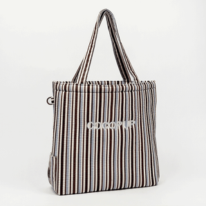 Front studio view of the Cocopup London brown and blue striped tote bag