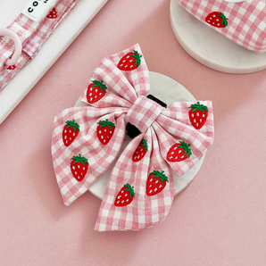 Strawberry Picnic Pup Sailor Bow Tie in a pink product flat lay