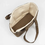 Top view into Cotswold Check carrier showing cream-lined interior and reversible base