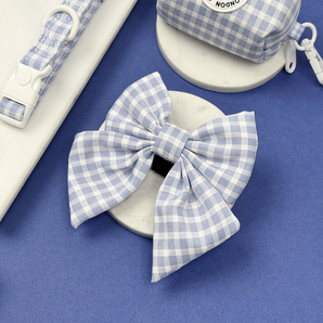Cocopup London English Blue Sailor Bow Tie displayed in a blue and white flat lay