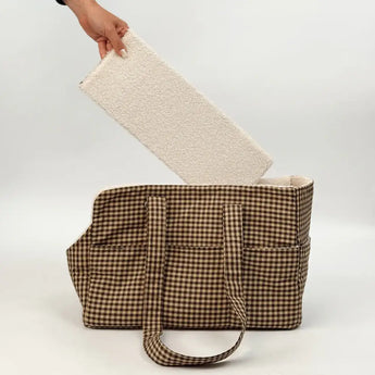 Cotswold Check carrier with cream Borg side of removable base being inserted