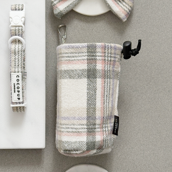 Oxford Plaid drawstring treat pouch viewed straight from above beside a matching collar