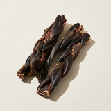 Braided Beef Hide with Esophagus (15cm / 100g) on a neutral background